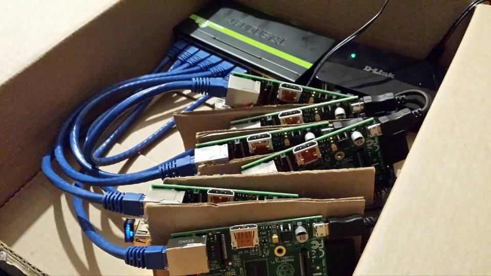 A box with 6 credit-card sized computers running a Linux cluster